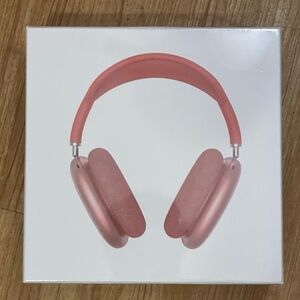 Orange Apple AirPod Maxes